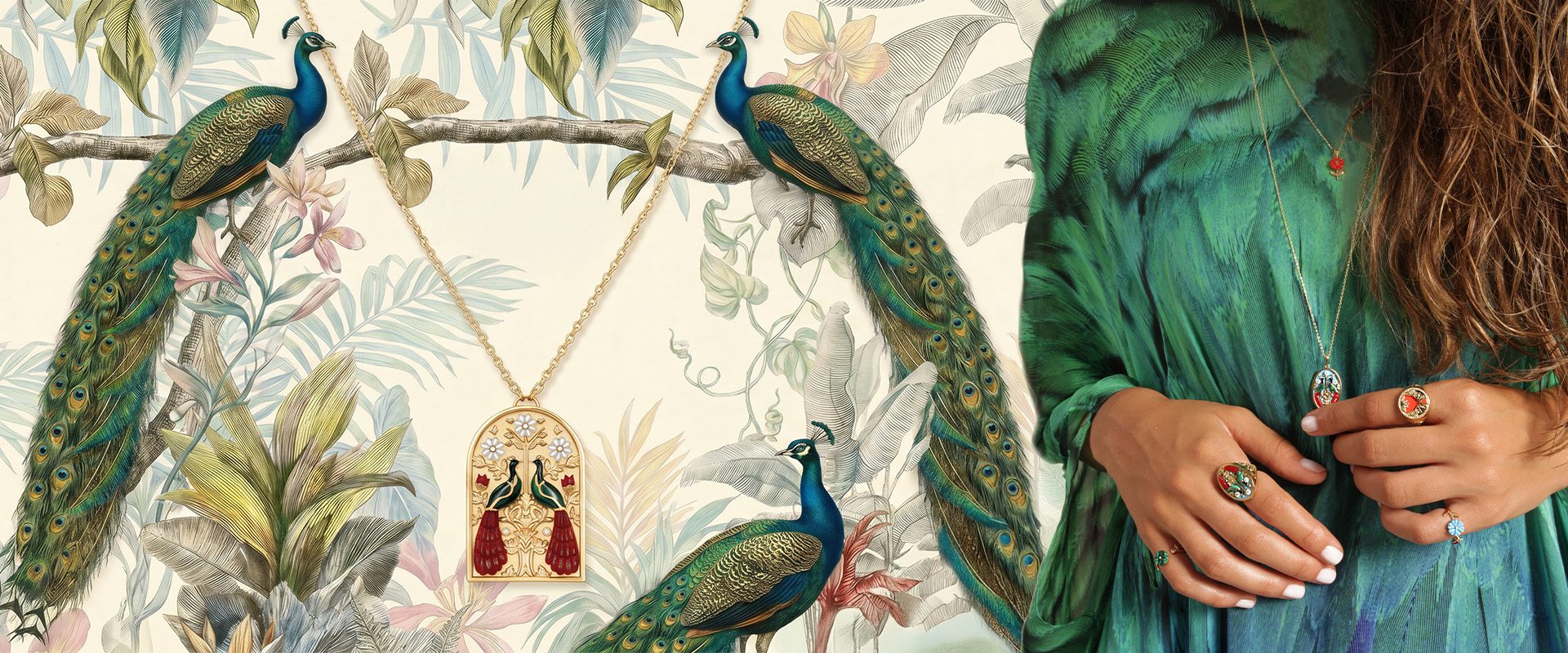 A gold and enamel love-birds pendant hanging against a painted backdrop of peacocks and palm leaves, beside a model in emerald silk wearing Wild Treasures enamel rings.
