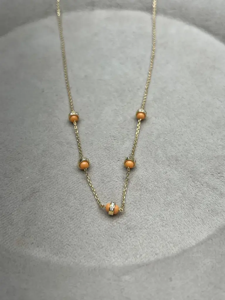 [N150O] NECKLACE ATOM 5 ATOMS ORANGE